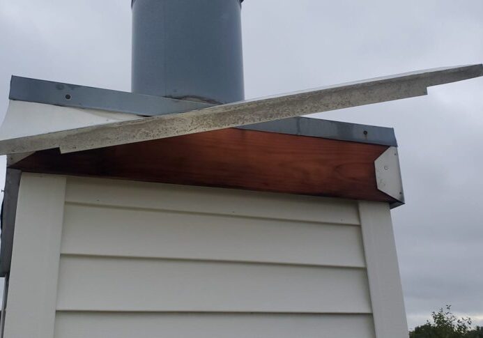 wind-damage-chimney-trim