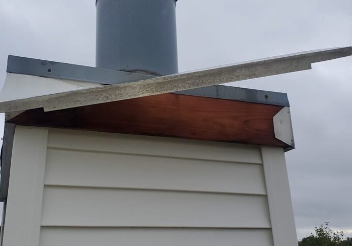 wind-damage-chimney-trim